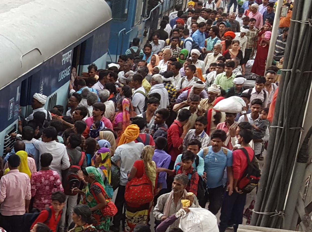 crowd in trains, fights for ticket