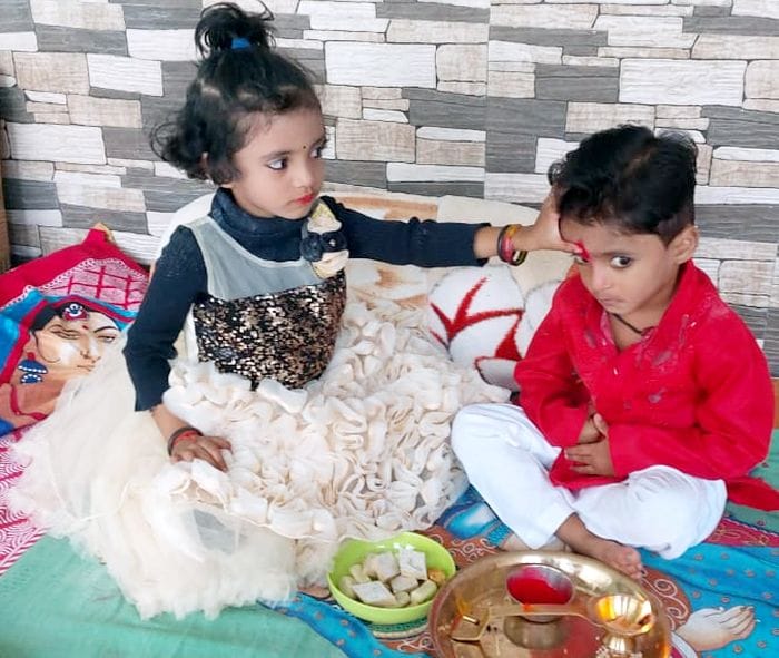 Sisters sought long life by applying tilak to brothers