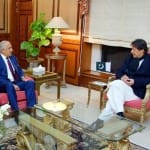 Imran Khan with US special envoy Zalmay Khalilzad