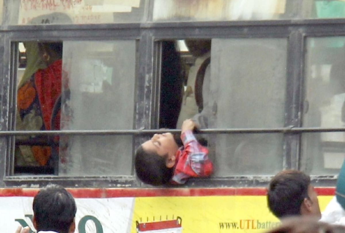 Child pushed Into window for seat in roadways, neck stuck in bijnor