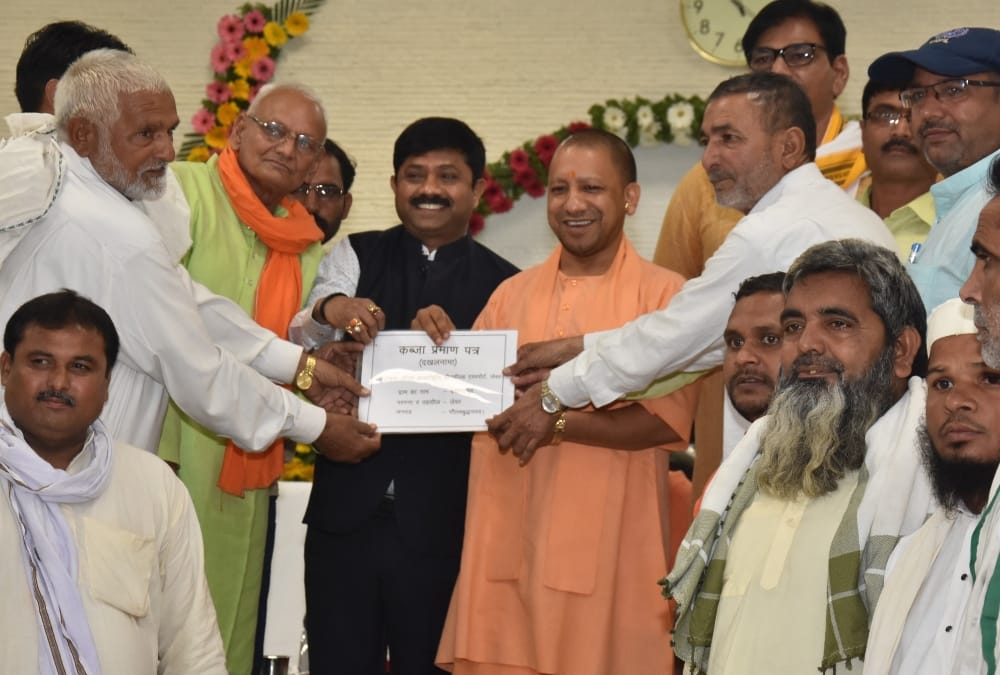 development is essential for happiness says cm yogi