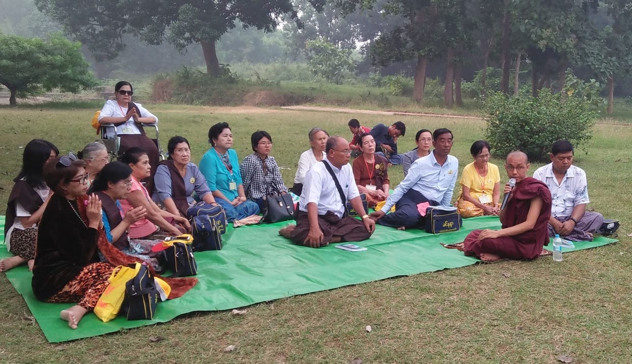 Worshipers from Myanmar pray for world welfare