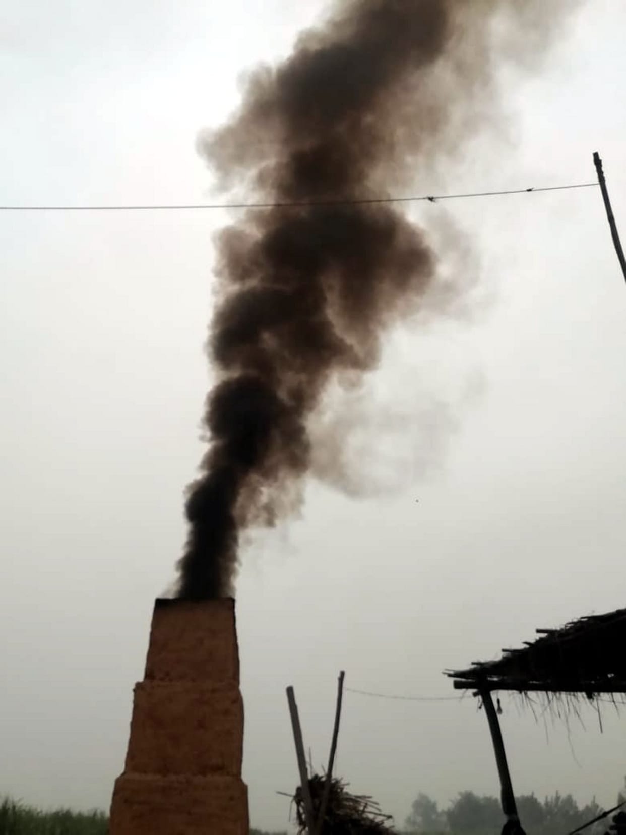 The chimneys of the crushers emit smoke