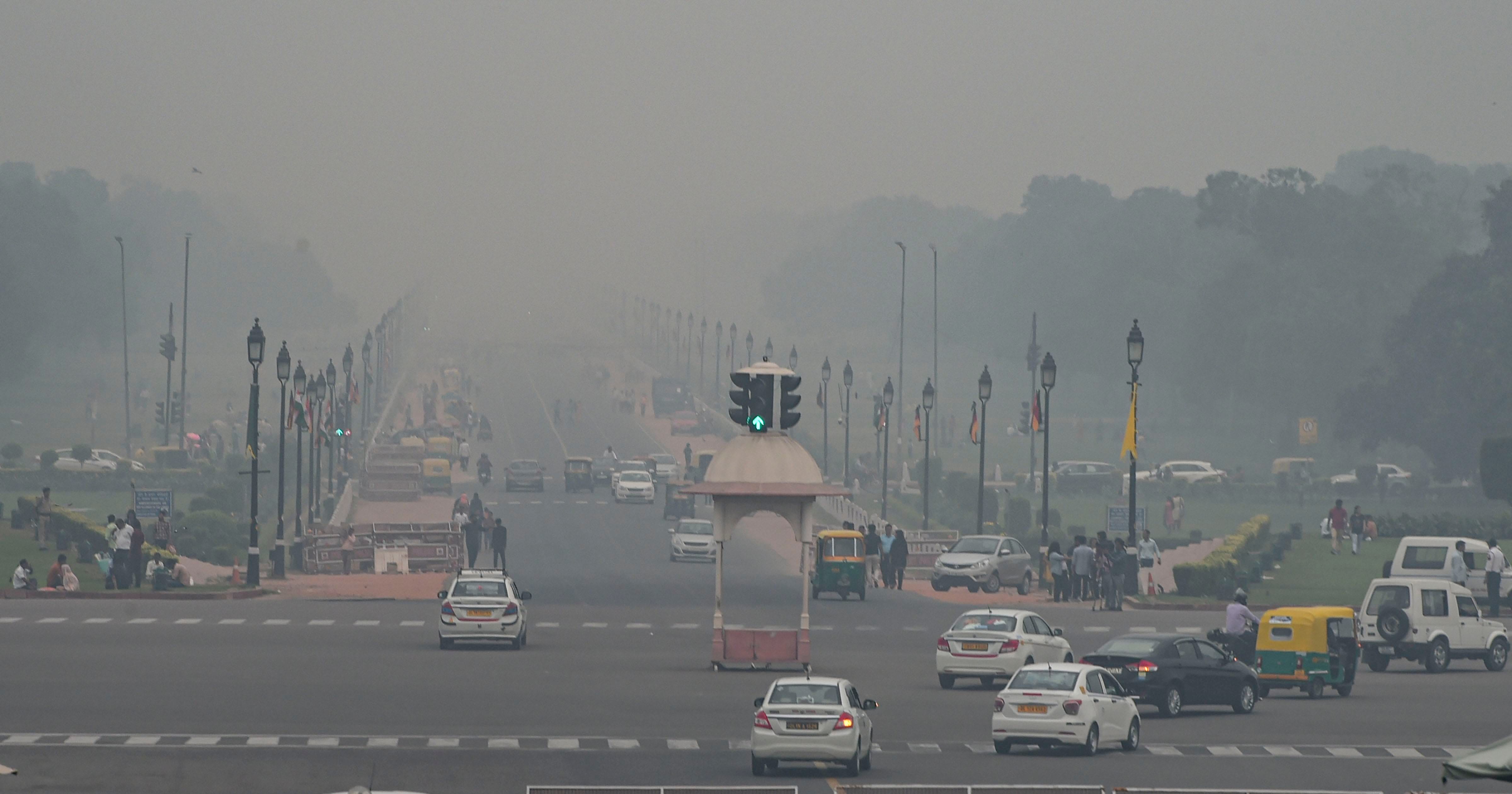Two Seasons In Country See In Photos, in Southwest raining in North India poisonous air