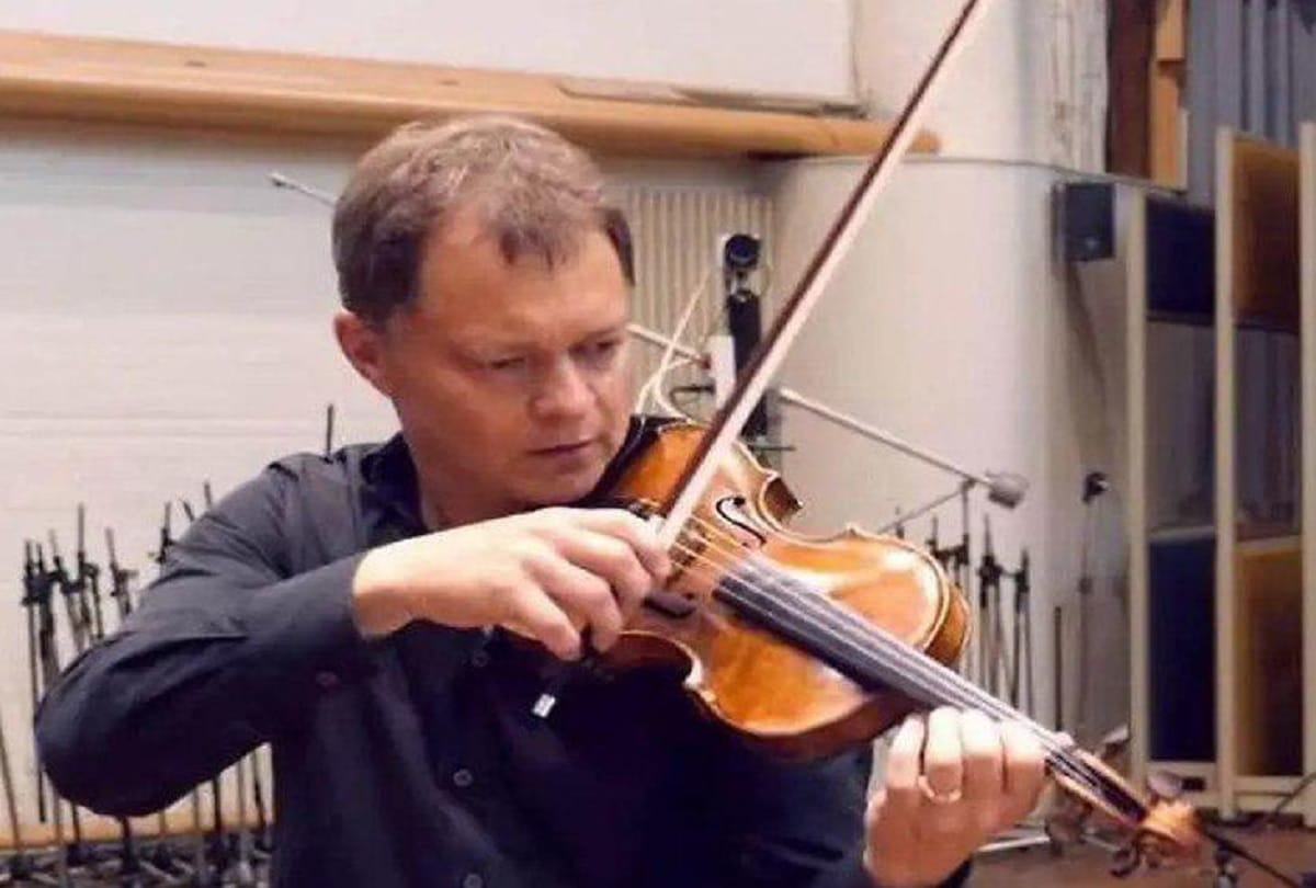 310 year old antique violin stolen from a train has been reunited with its owner