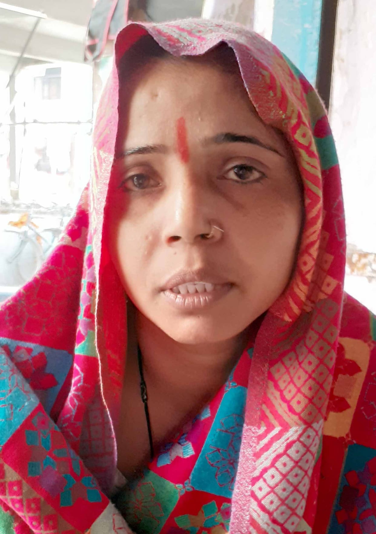 the women marriage with dead lover's photo