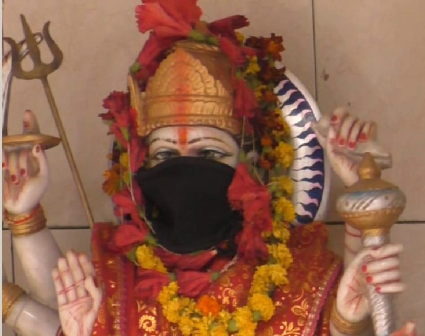 God wear mask in Varanasi to save from pollution