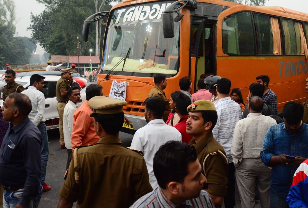 Bus hit scooty, women died and her son safe