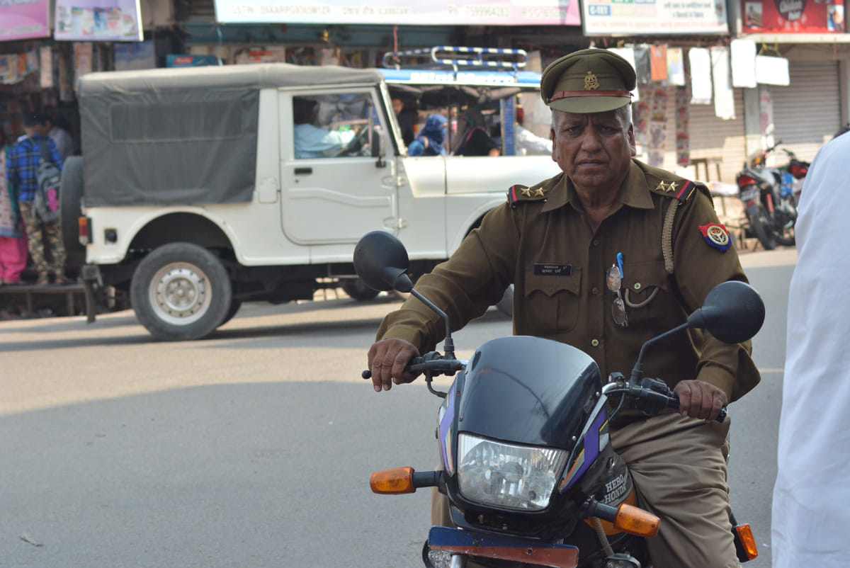 Most policemen driving without a helmet