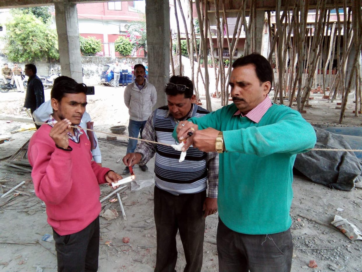 Building seal under construction without a map along the Ganges