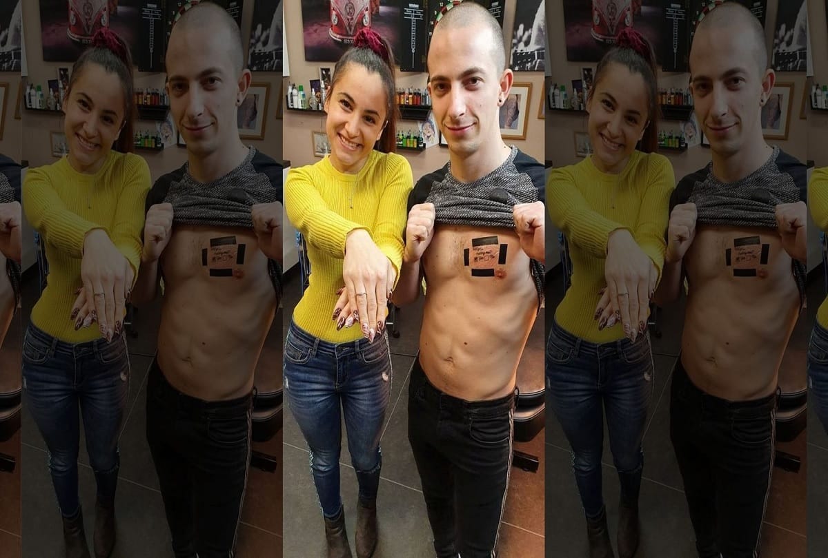 Man proposes his girlfriend in a creative way with Will you marry me tattooed on his chest