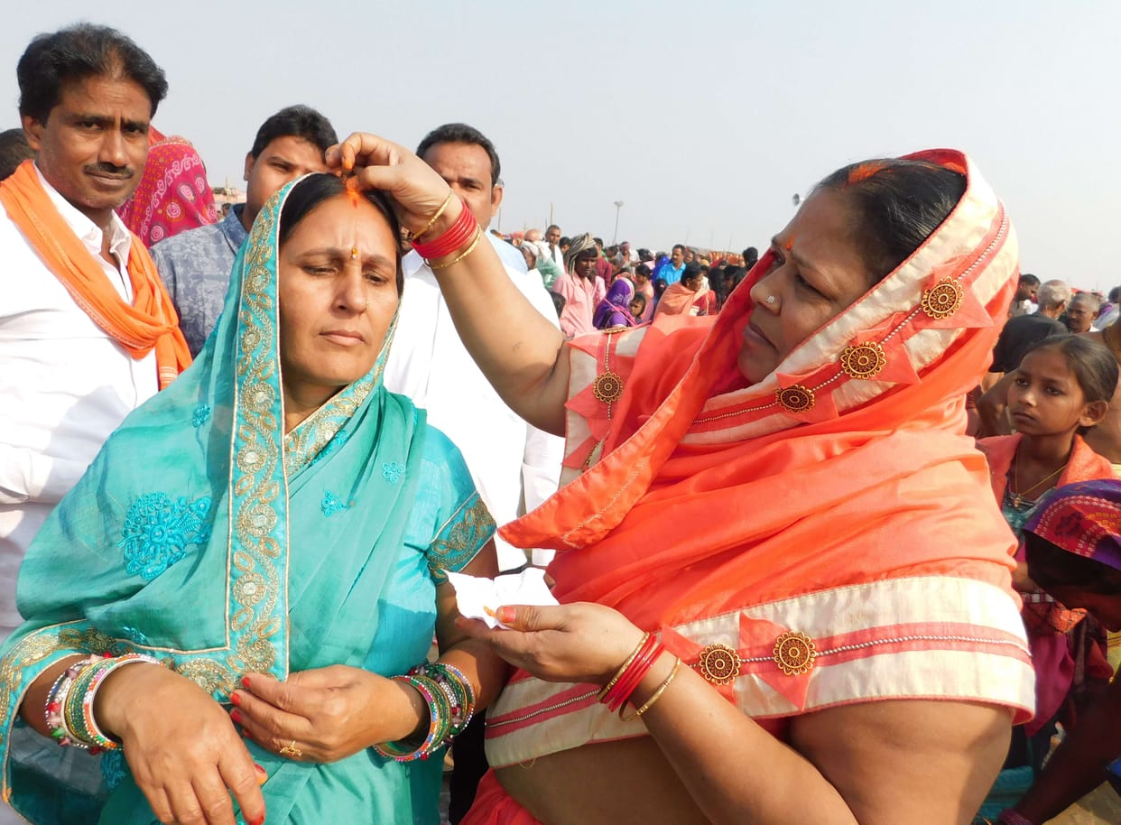 Confluence of bathing, meditation and charity on the banks of tributaries