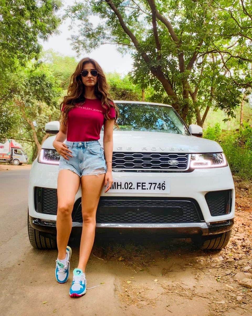 disha patani in crop animal print off shoulder top