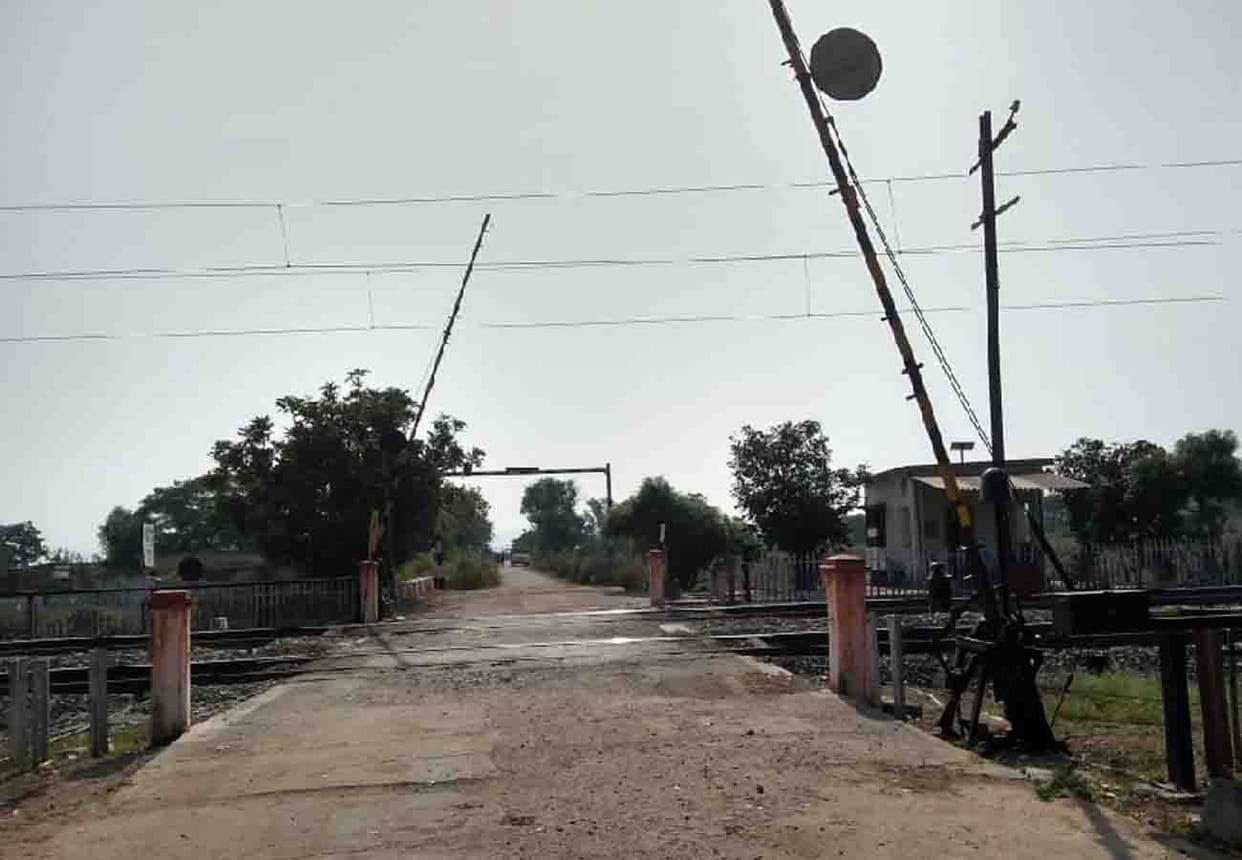 railway gate remains open and the train passed in chitrakoot