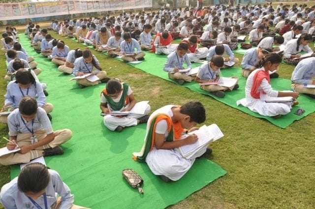 for goldan book of world record three hundred students write similiare