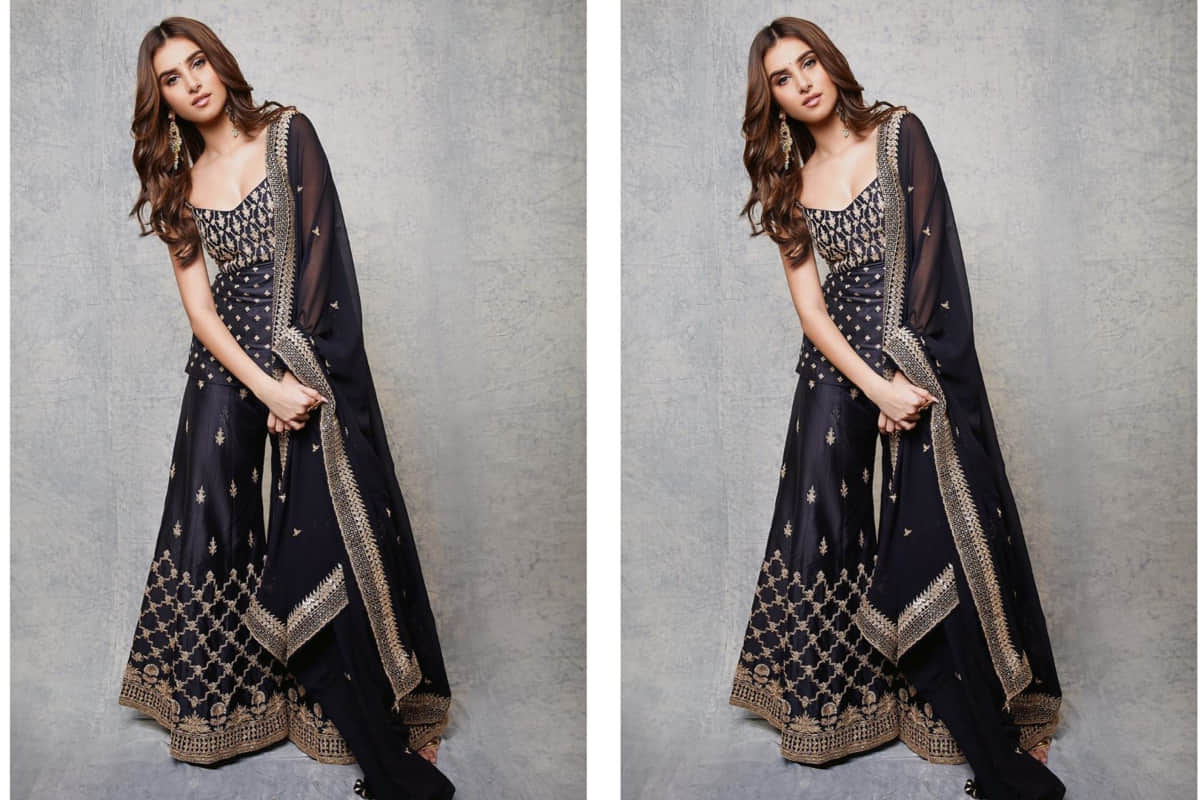 tara sutaria look beautiful at marjaavan promotion in black lehenga choli