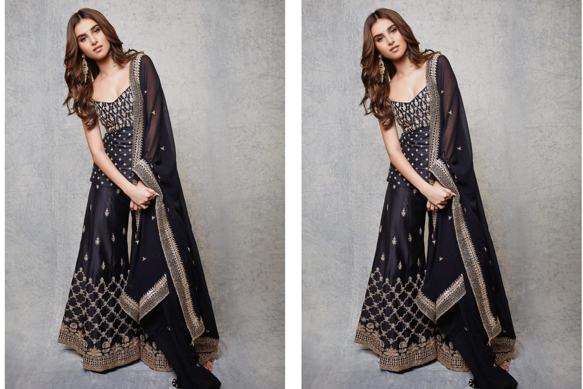tara sutaria look beautiful at marjaavan promotion in black lehenga choli