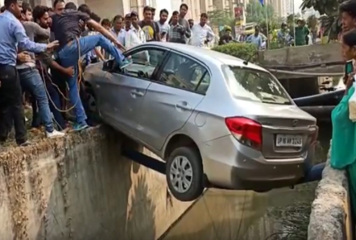 greater noida car swing on a pipe over drain for 35 minutes but driver saved video viral