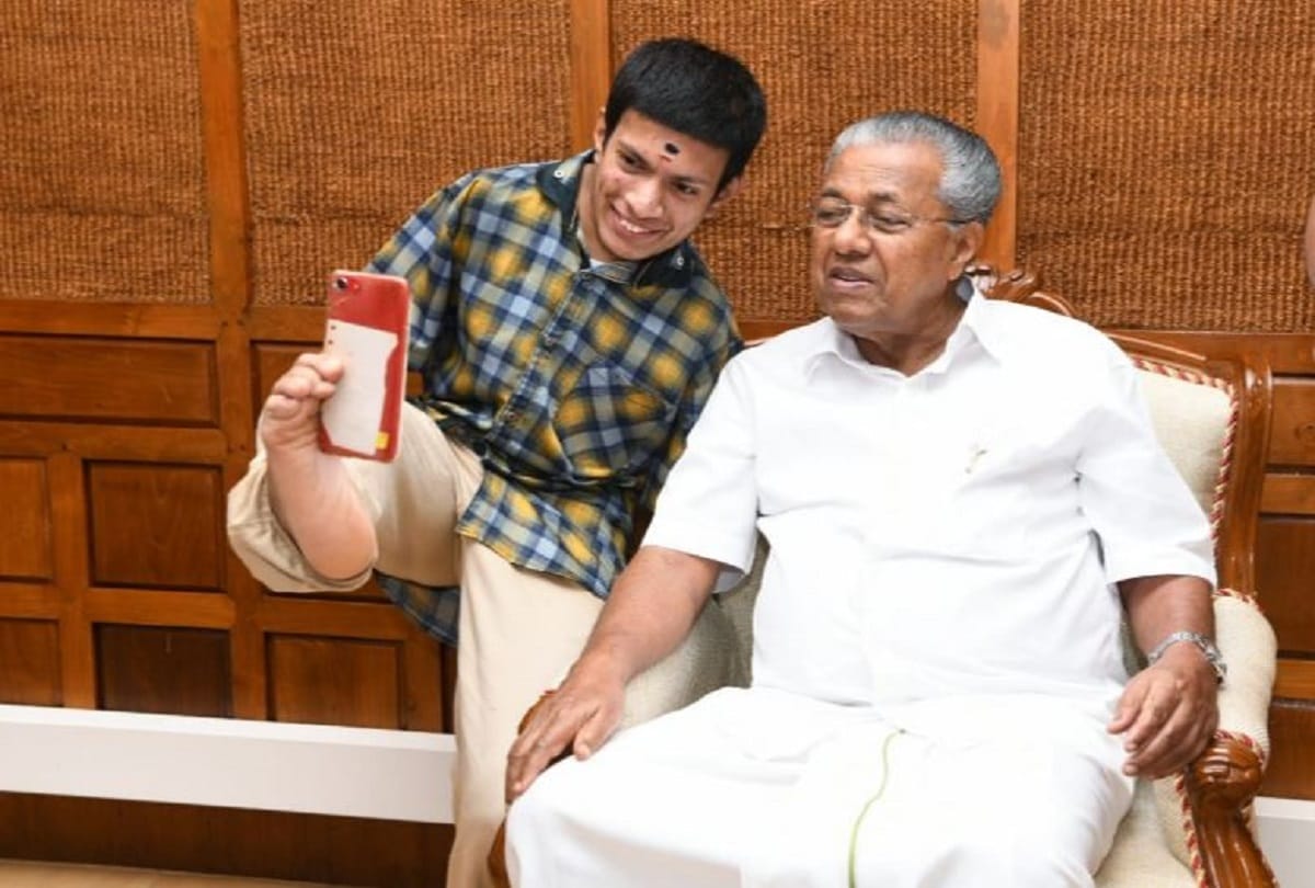 Kerala Artist Paints With Feet Donates Prize Money In Relief Fund Took selfie with Chief Minister