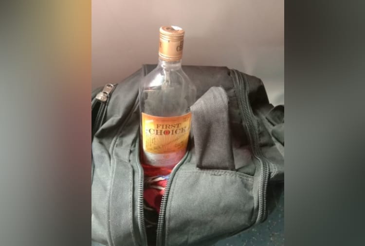 Passengers drinking alcohol in Gorakhdham Express train