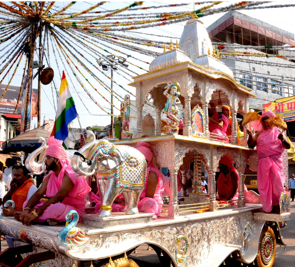 God seated in a silver chariot