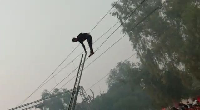 young boy climbing on ohe
