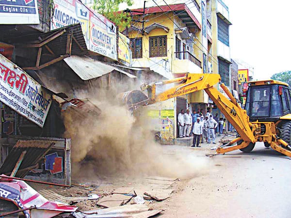 Mark the encroachers and remove the encroach by giving notice