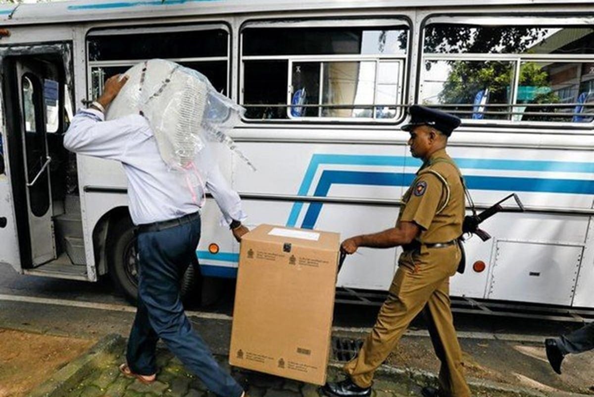 Srilanka Police say an unidentified group hurled stones, opened fire on two buses carrying voters