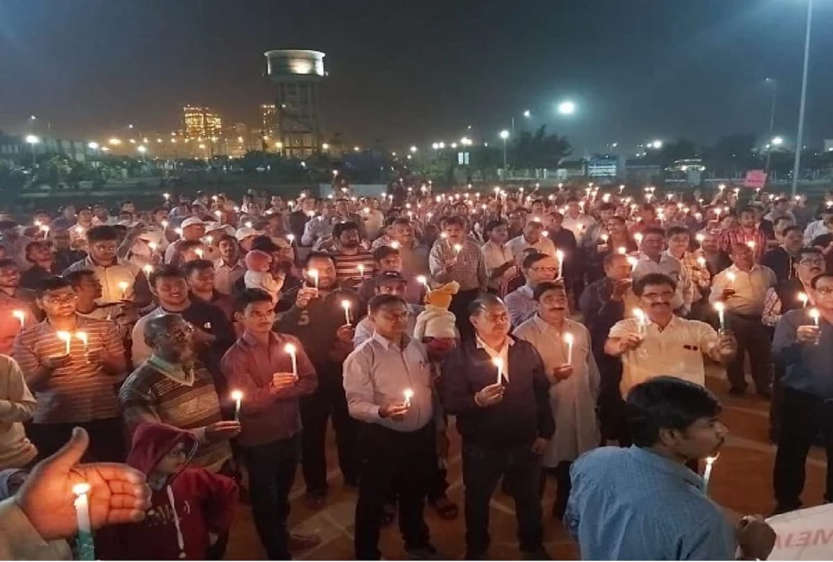 Meja Power Project employees protest candle march in protest against privatization