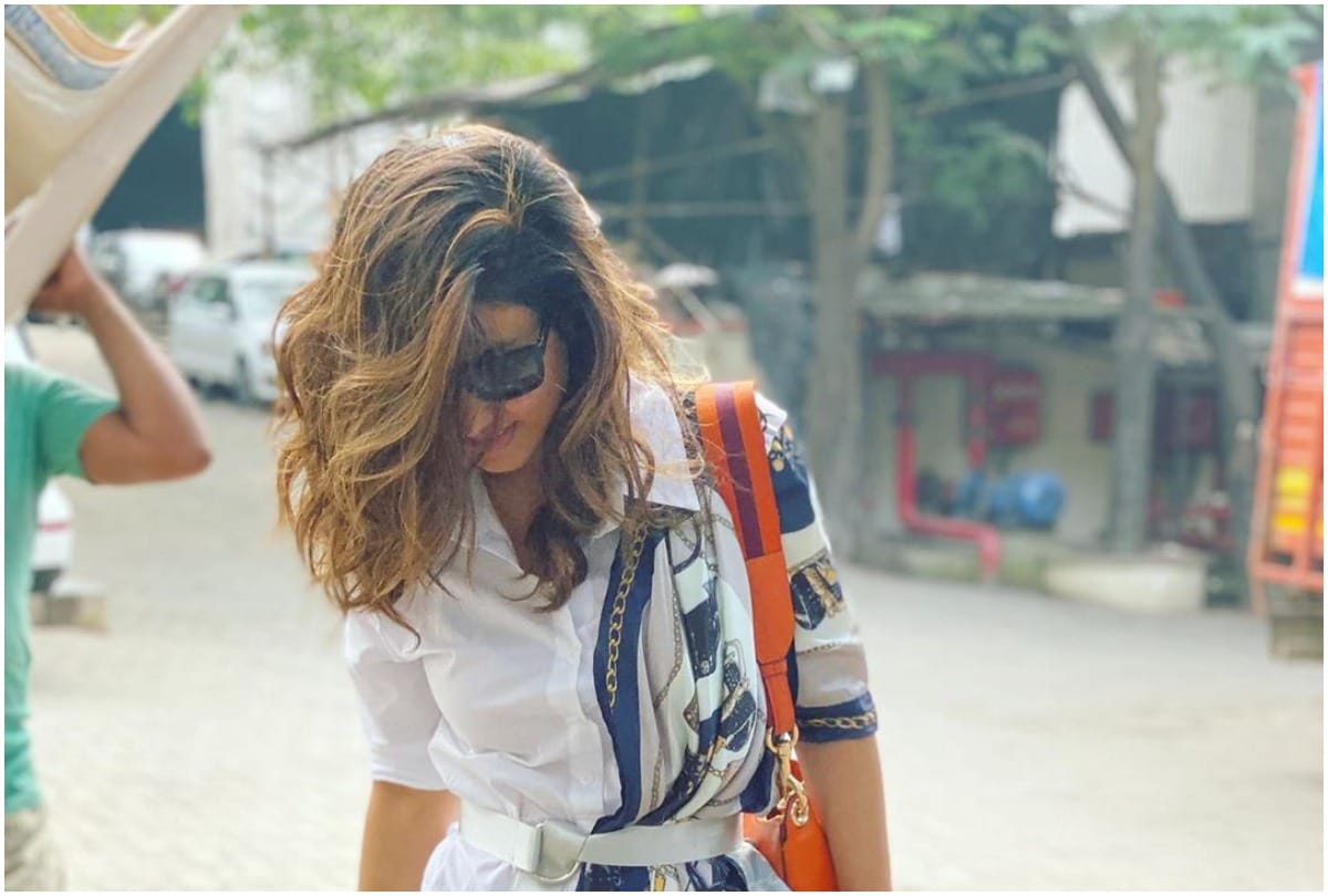 hina khan street style look in white shirt dress and blue scarf