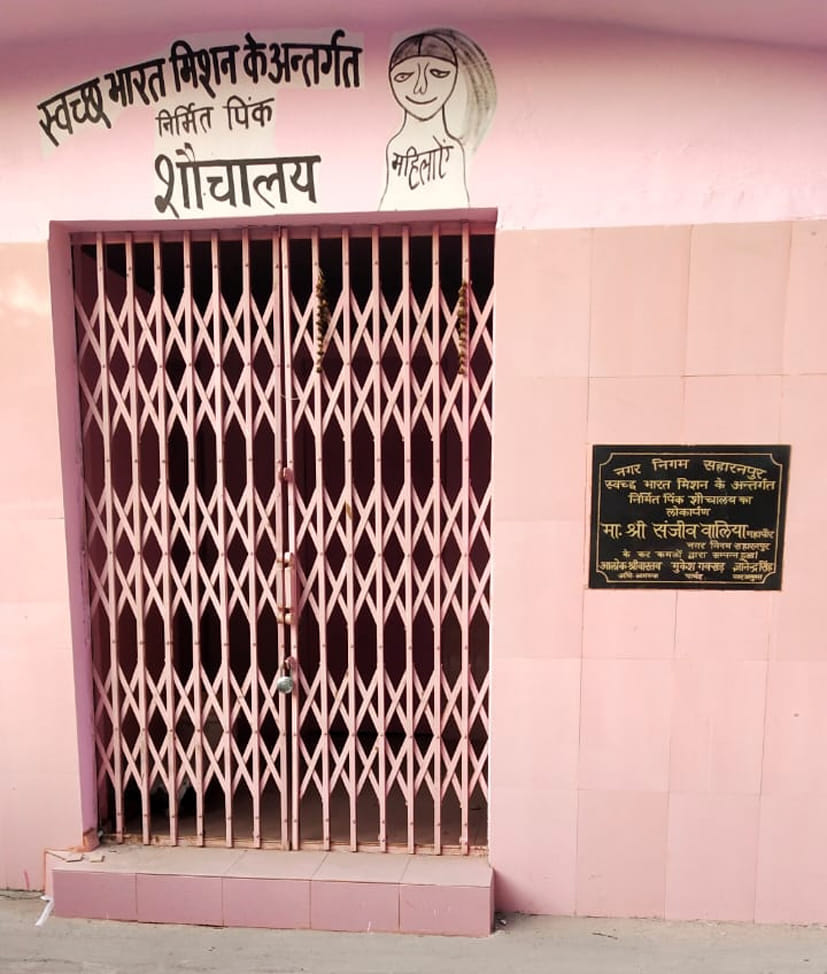Corporation's lock has been hanging on the pink toilet for four months