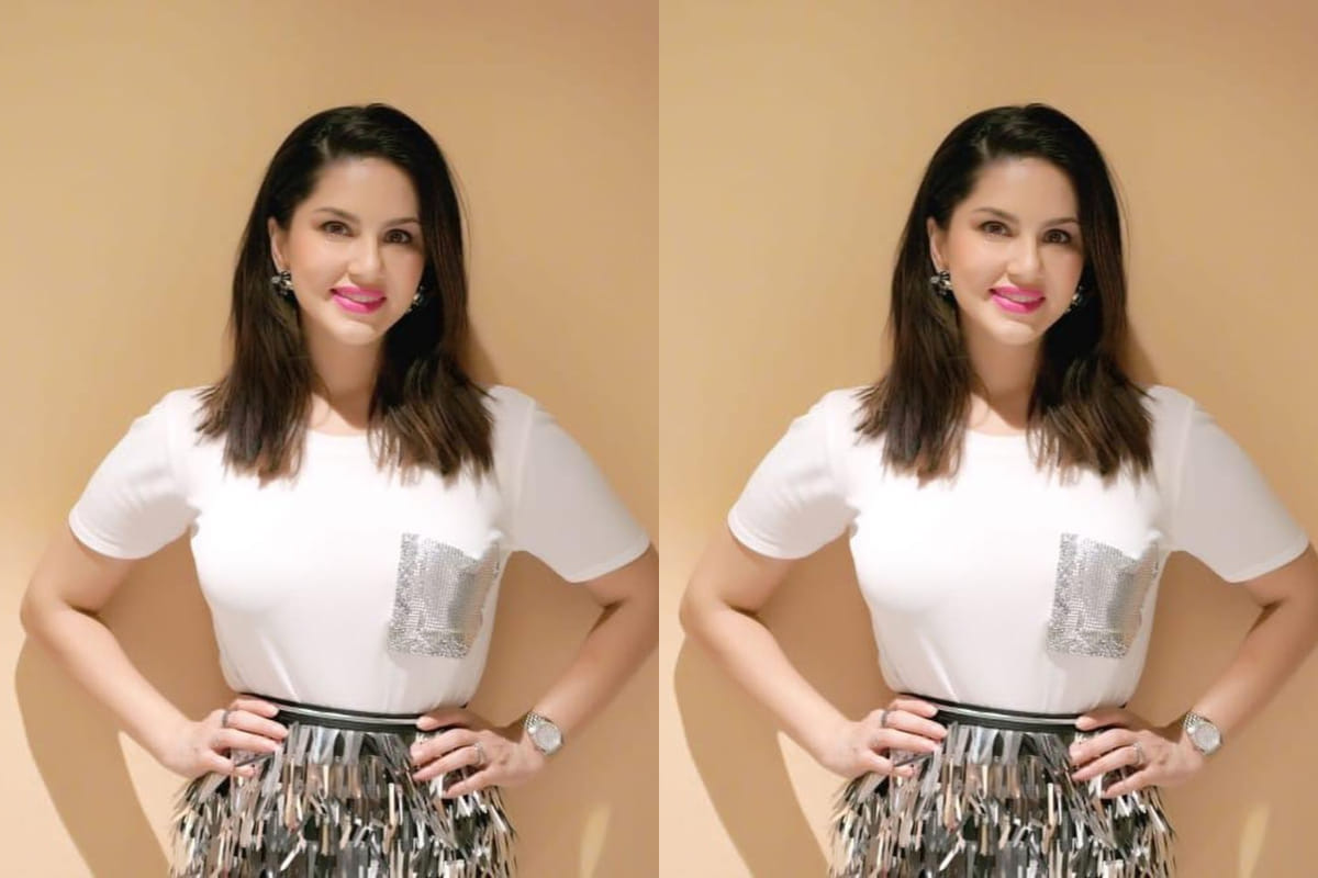 sunny leone rocks gorgeous casual look in shimmer skirt and white top