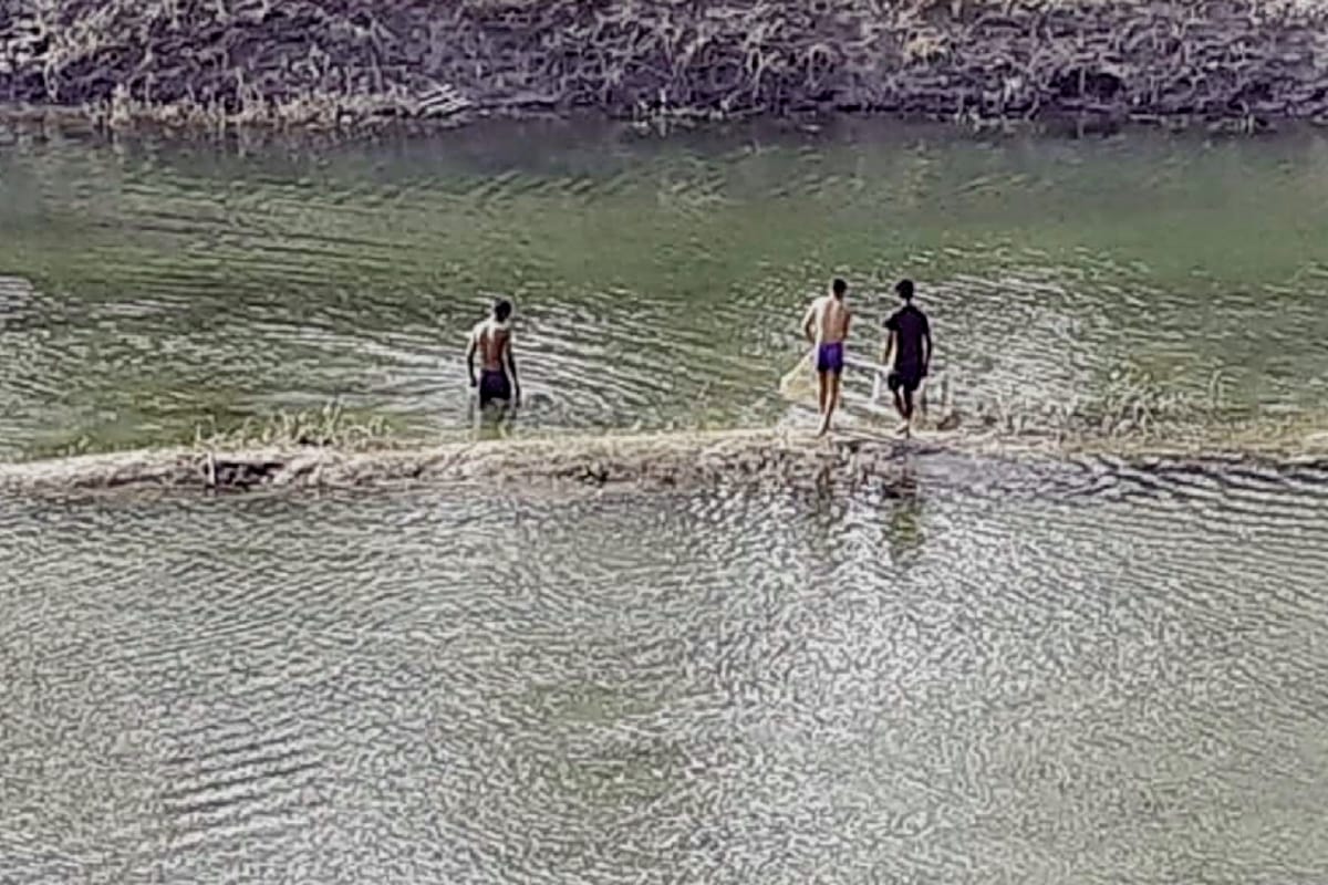 People started fishing with sticks in rive in Hastinapur, Meerut