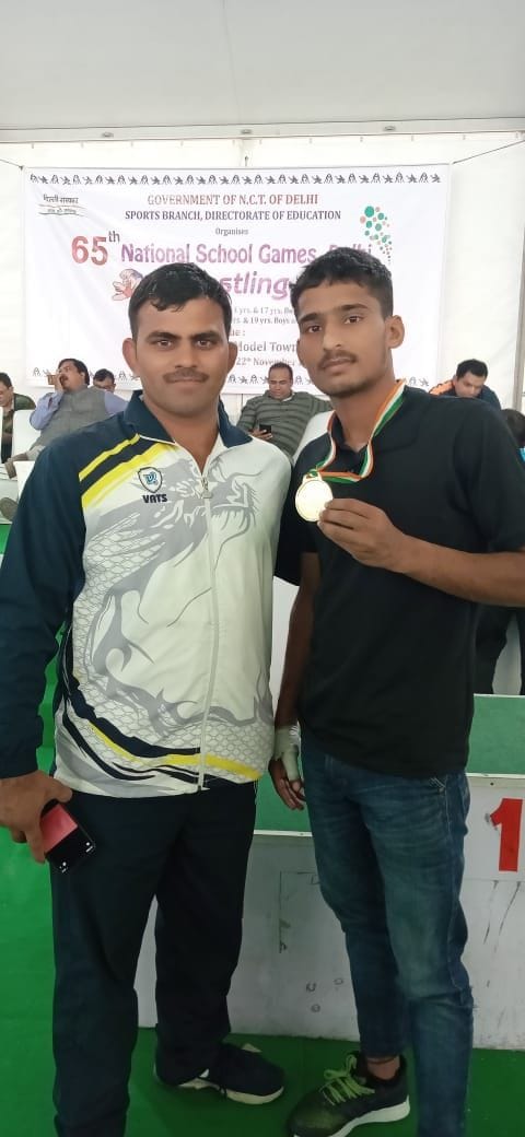 Vinay won gold medal in national wrestling competition