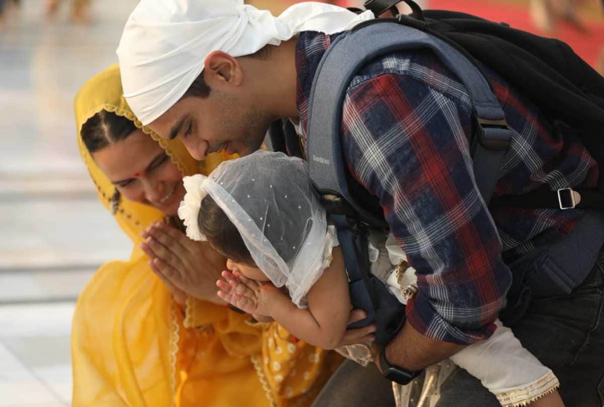 Neha Dhupia and Angad Bedi visit golden temple with daughter mehr dhupia