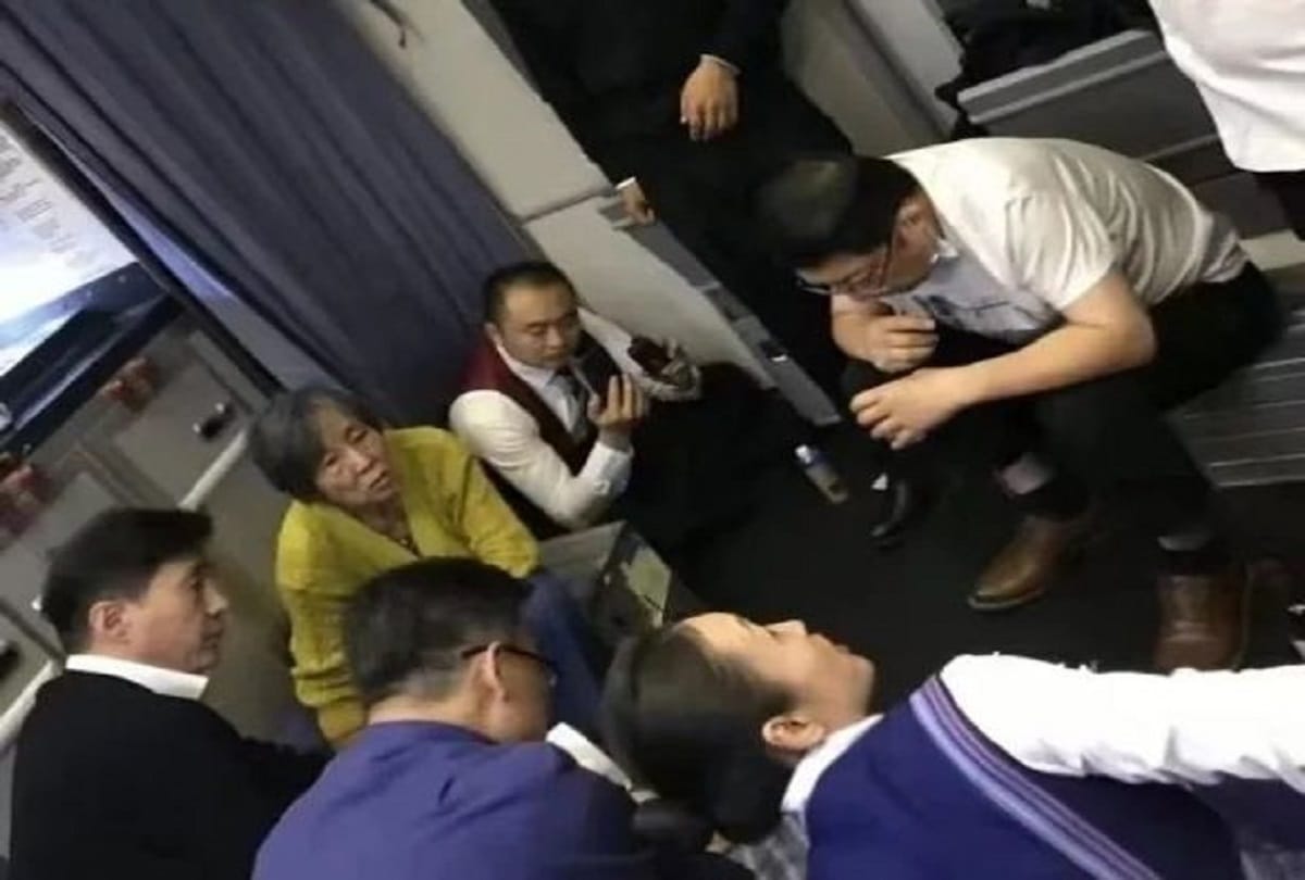 doctor saves life of passenger on flight by sucking urine from the bladder