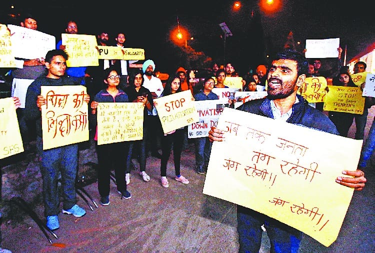 punjab university students march out against fee hike
