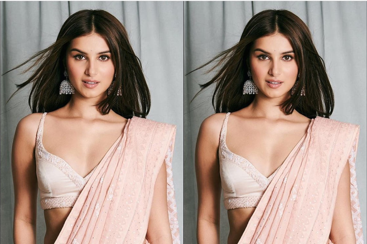 tara sutaria looks gorgeous in coral pink saree at marjaavan event