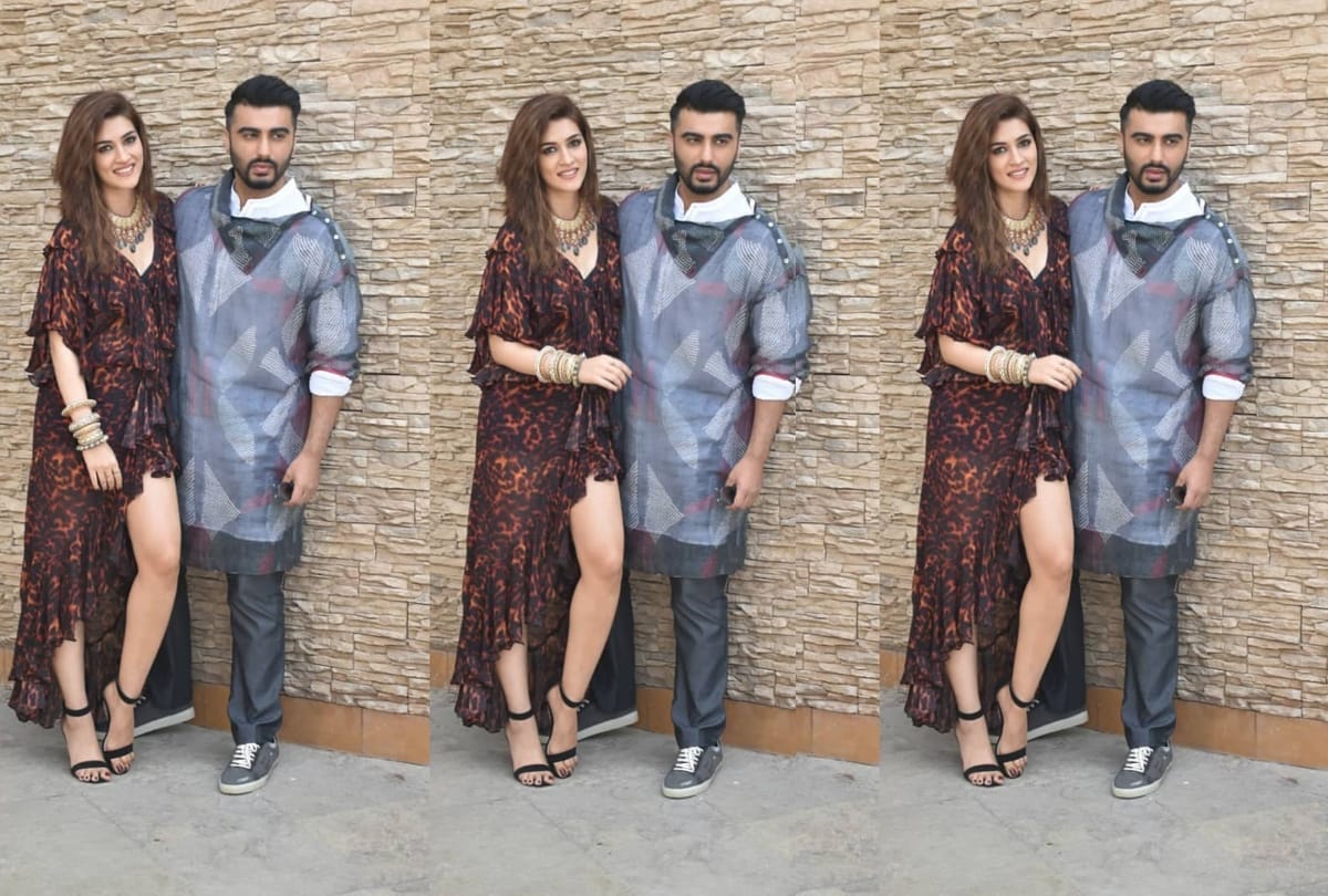 kriti sanon in heavy jewellery with thigh high gown