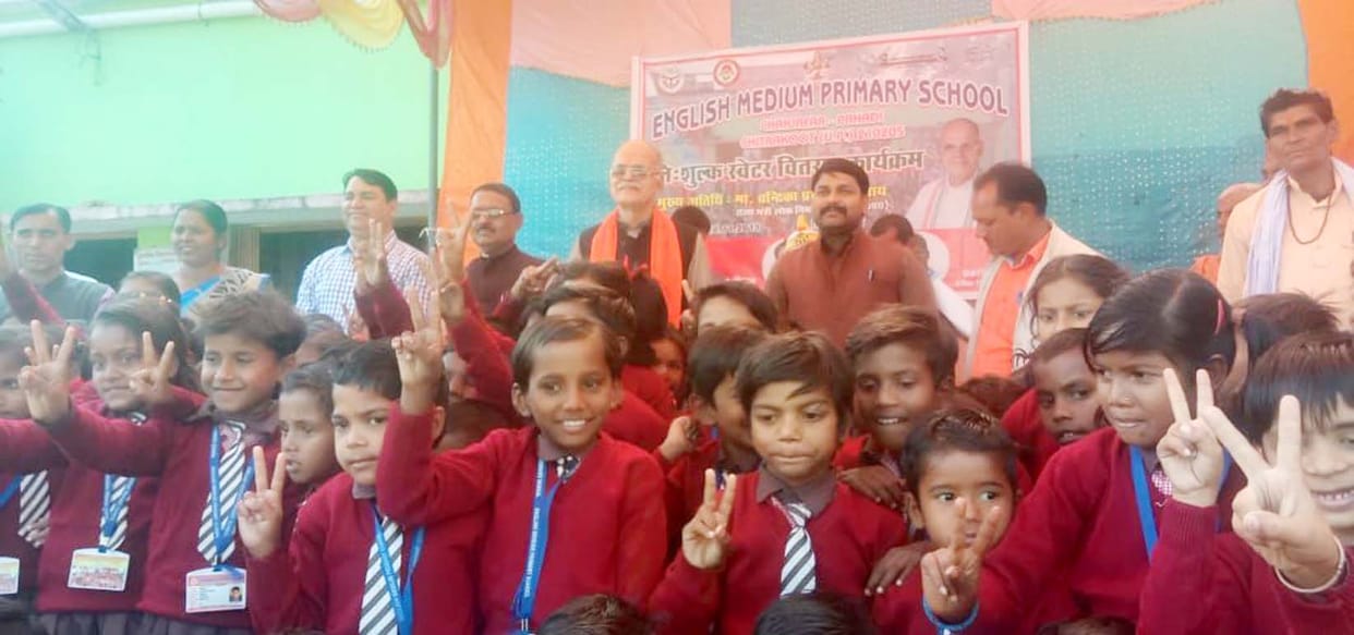 Children's faces blossom after getting sweater in cold