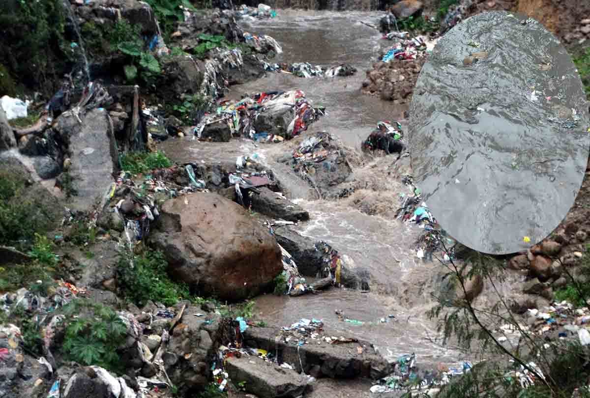 In heavy rain Devika River udhampur jammu water appeared completely black with dirt