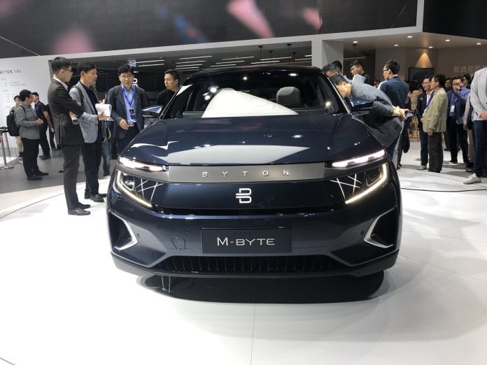 japanese car companies Toyota and Honda Hybrid cars beat the Chinese electric car market