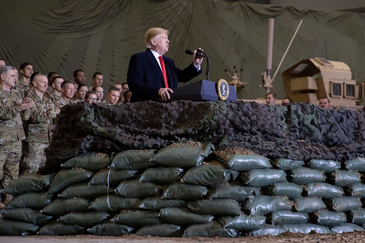 Donald Trump makes unannounced visit to Afghanistan, says talks with Taliban revived