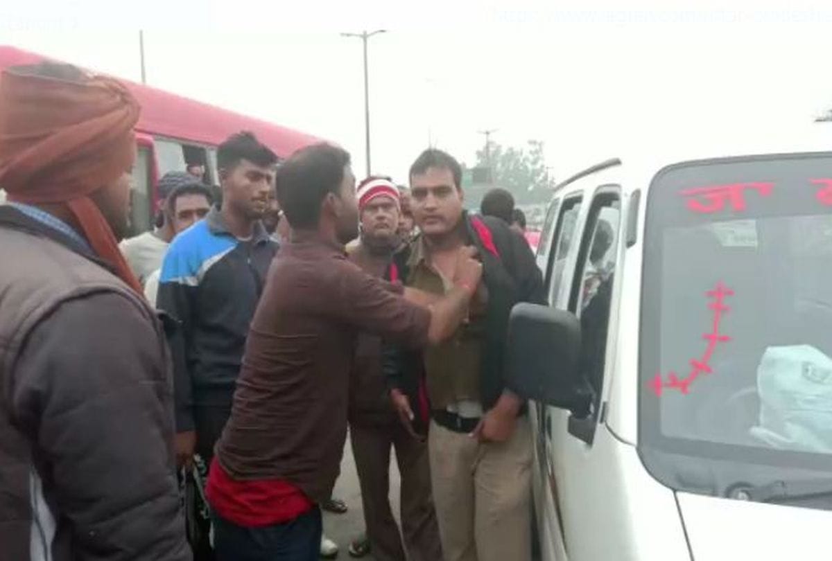 car driver beaten the policeman on the road in firozabad