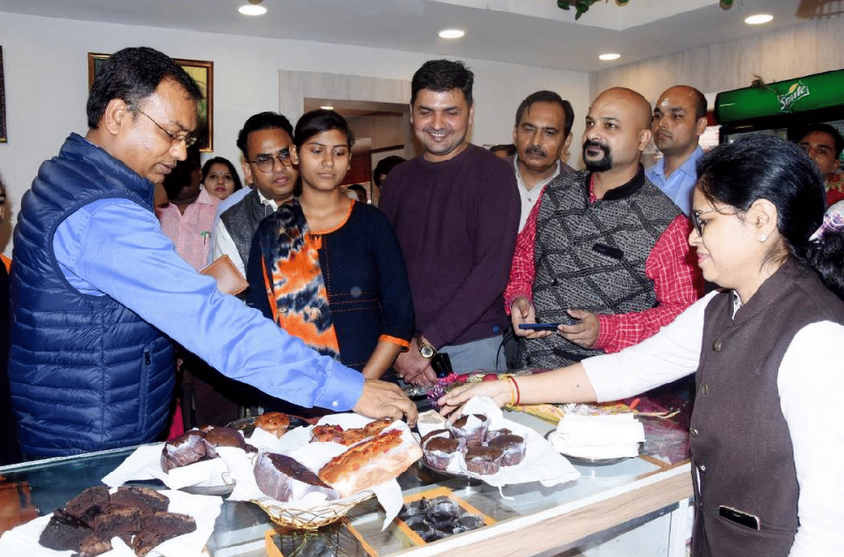 Cafe open in kashi vishwanath mandir Inaugurated help desk cake chocolate varanasi