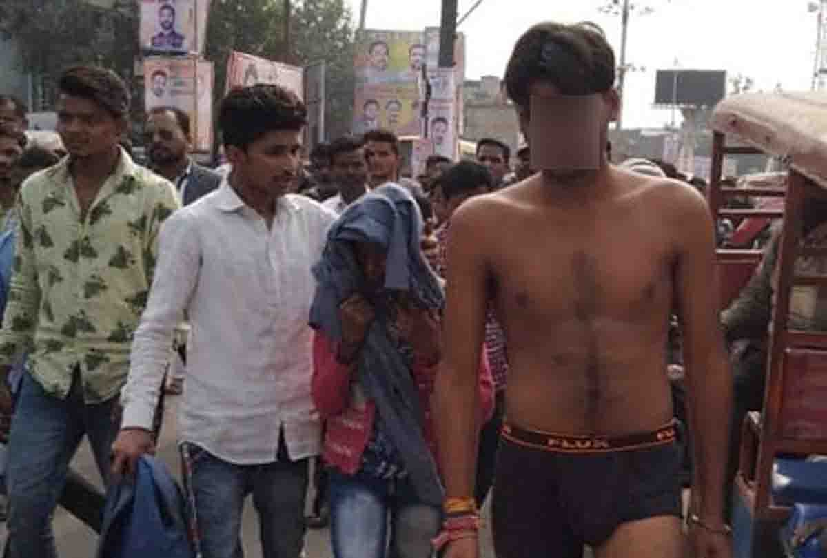 boy was beaten up on the charge of molesting and then rotate in market with the girl