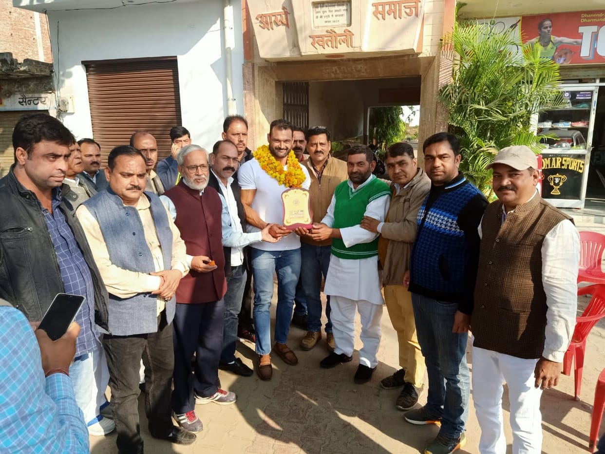 Gold winner Arun Chaudhary welcomed