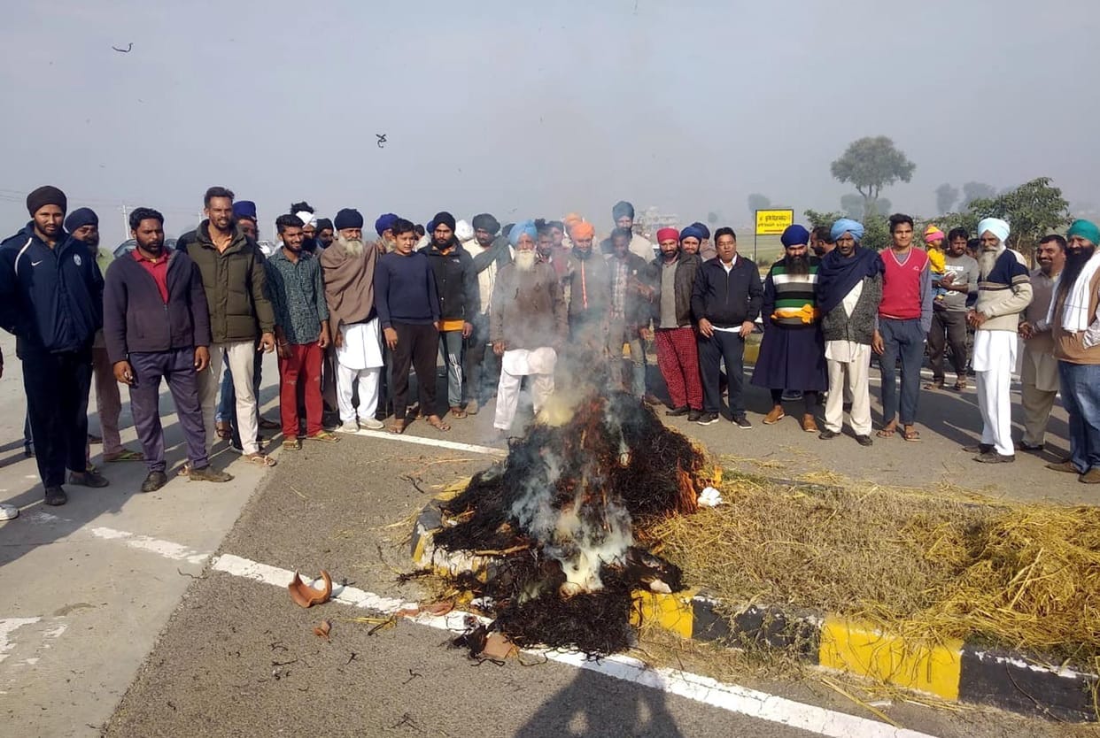 parali burnt fir, farmers blowing mannequin, fatehabad