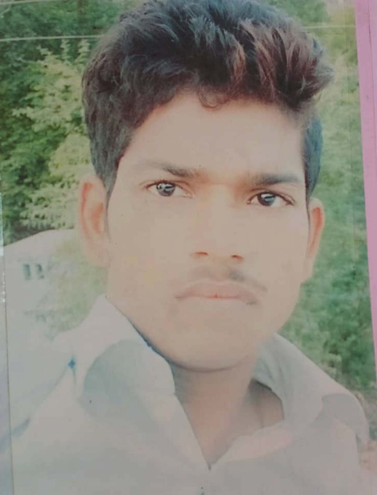 Young man strangled to death in suspicious condition