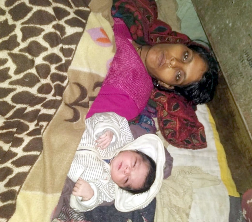 Ambulance stuck in jam, woman born child